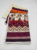 Traditional fabric with intricate patterns on a white background