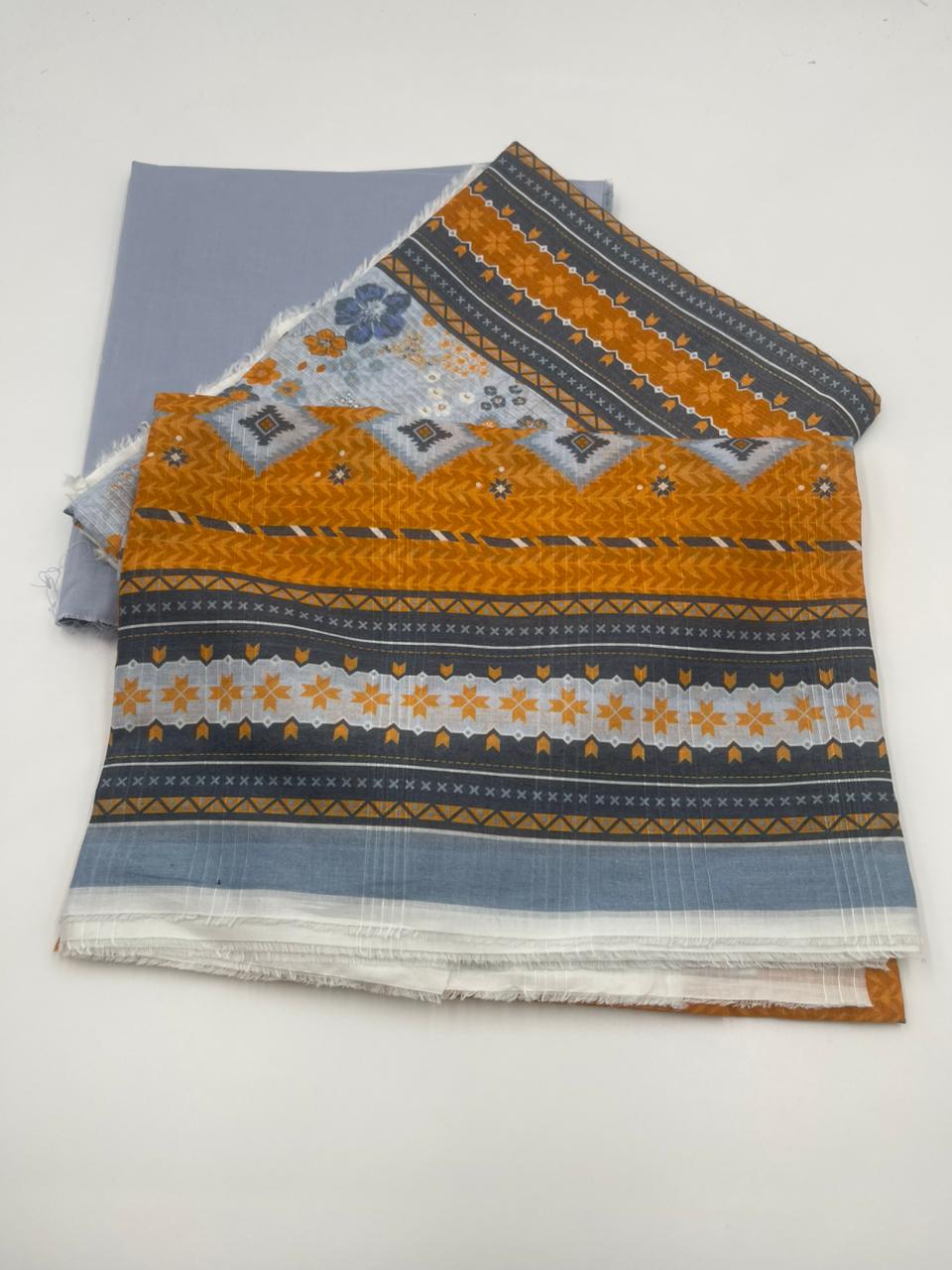 Stack of patterned fabric swatches on a white background