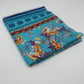 Folded fabric with floral pattern on a white background